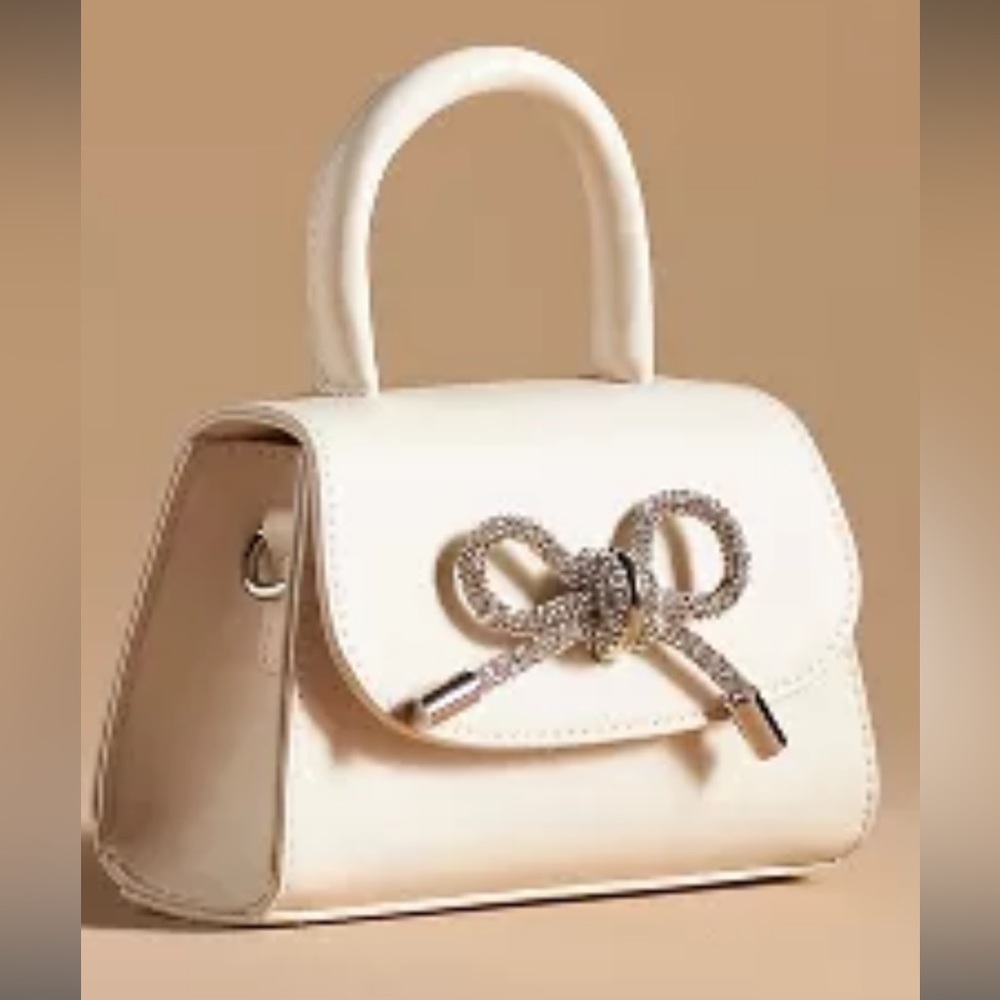 MELIE BIANCO RHINESTONE BOW MINI BAG